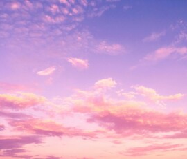 Pink and purple evening sky with clouds Pink and purple clouds in evening sky